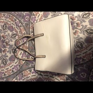 Tan and white Guess Purse